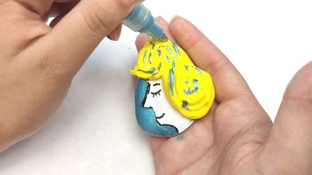 Step 9 Faces Rock Painting Tutorial Blue Acrylic Marker