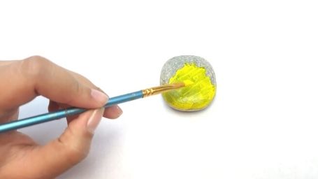 Step 10 Faces Rock Painting Tutorial Yellow Acrylic Paint
