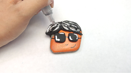 Step 18 Faces Rock Painting Tutorial Silver Glitter Glue