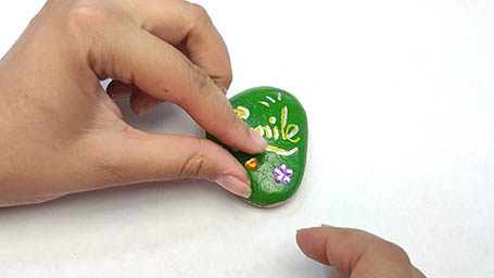 Kindness Rock Painting Tutorial Step 4: Outline Text Gem Stickers